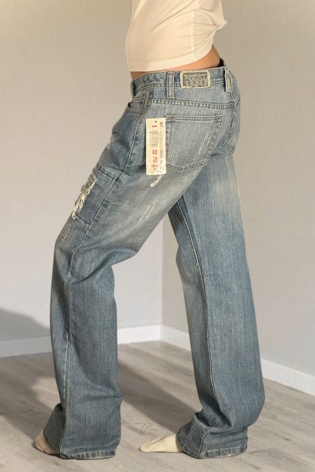Utsvängda jeans stl: M/L